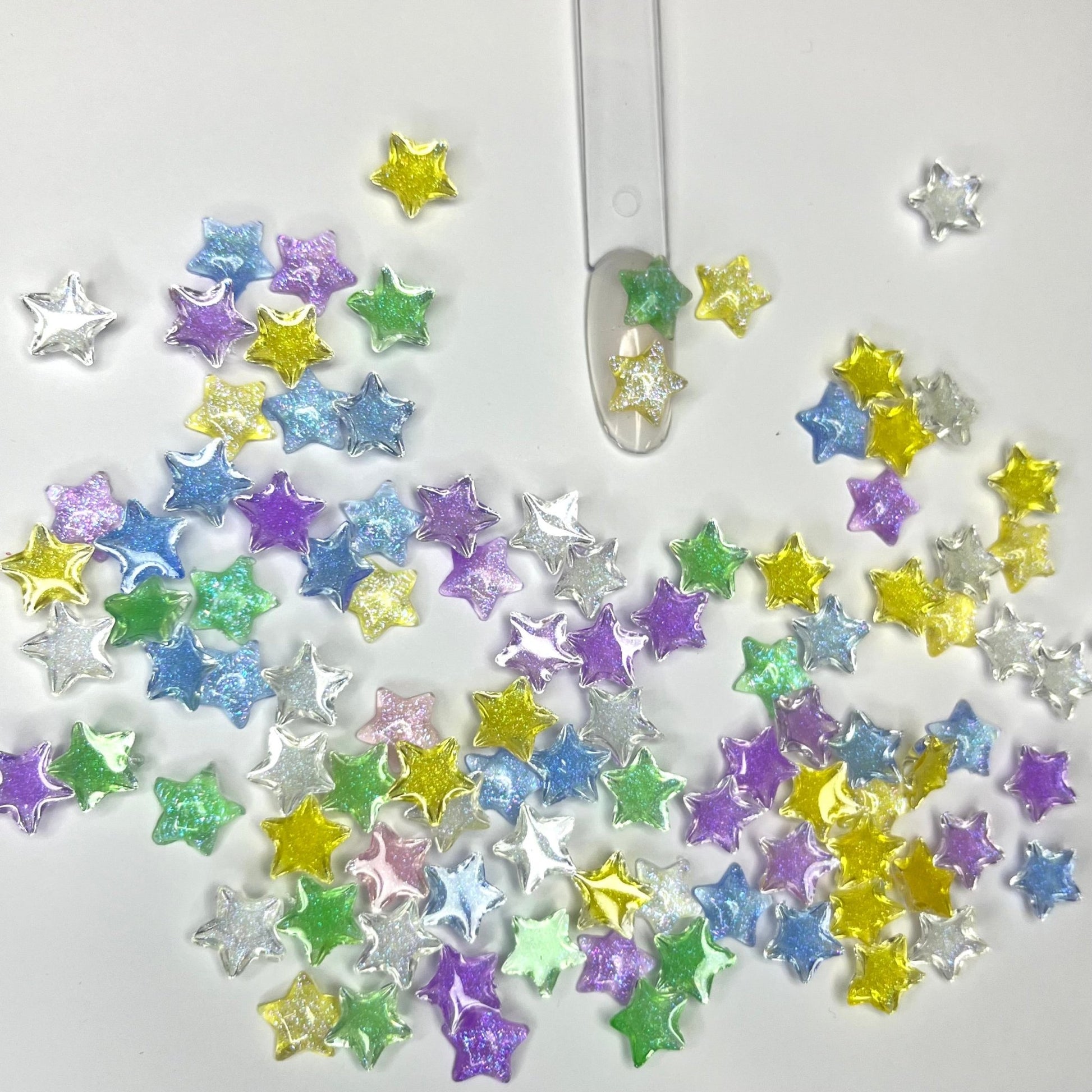 Étoiles transparentes Glitter 15pcs - Bling charm bar