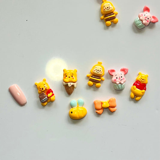 Mix Winnie l’ourson 🍯 (5 pcs) - Bling charm bar